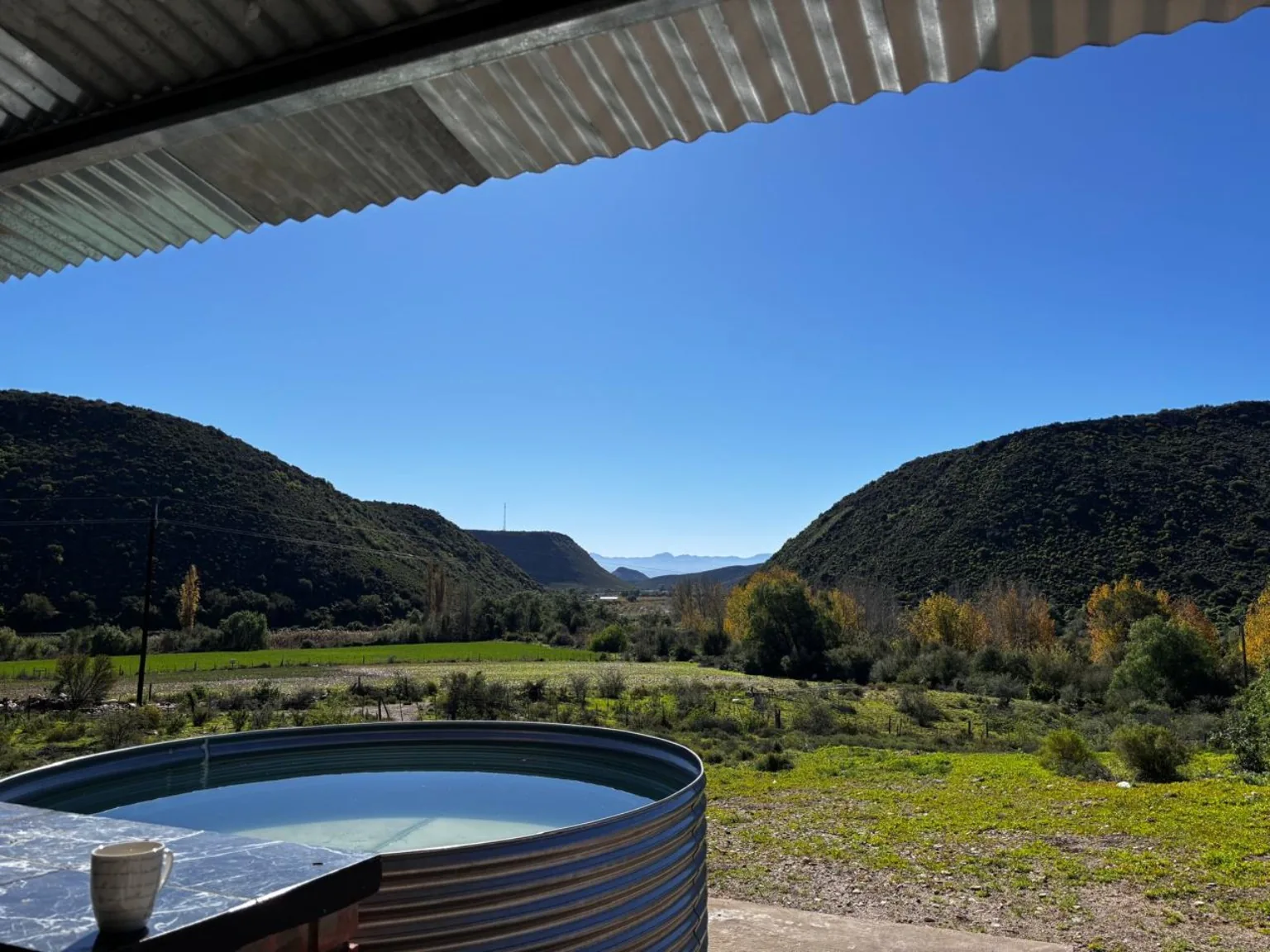 Splash pool overlooking the Klein Karoo farm valley
