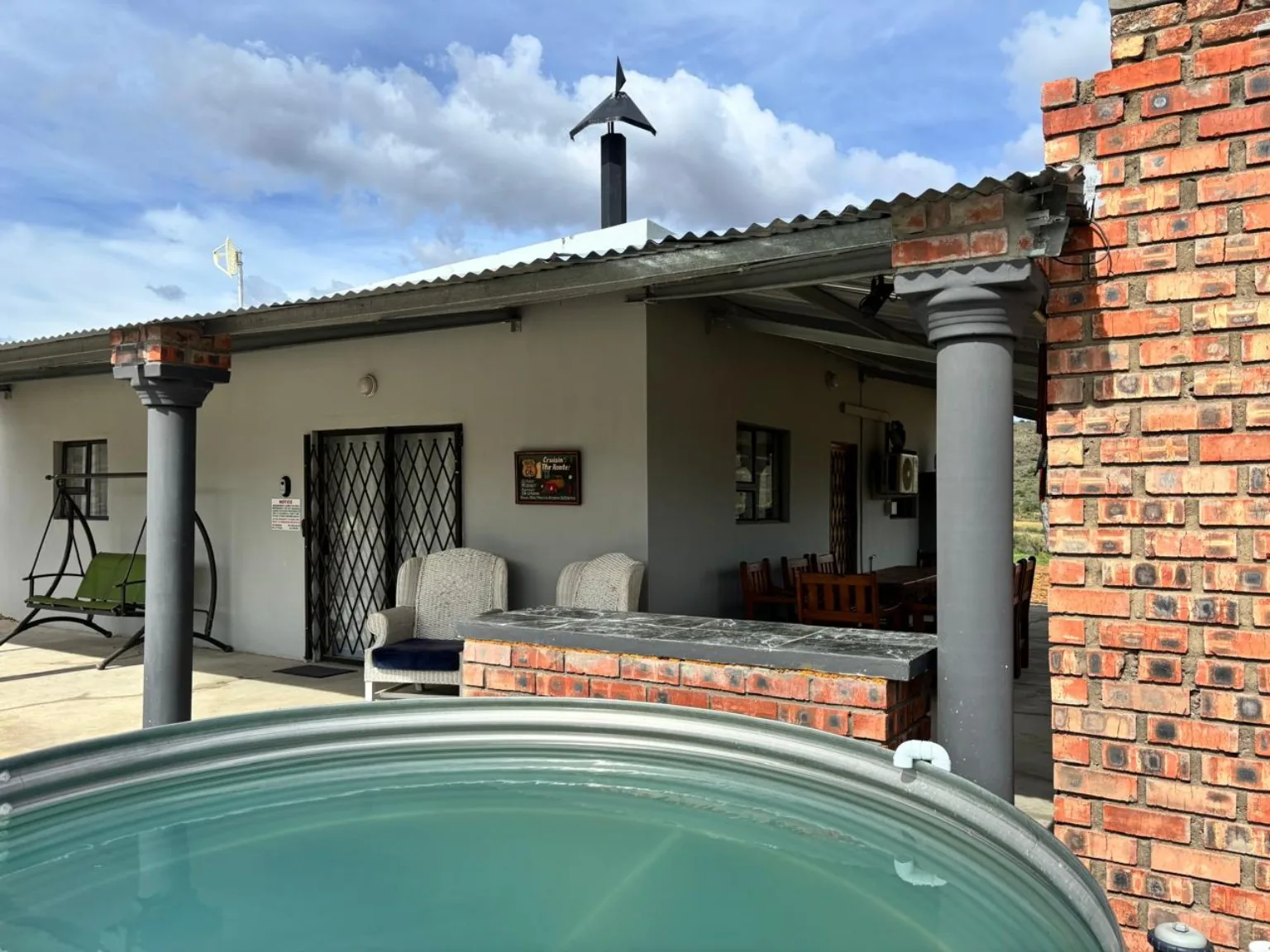 Gamtoosberg Cottage exterior with veranda and splash pool